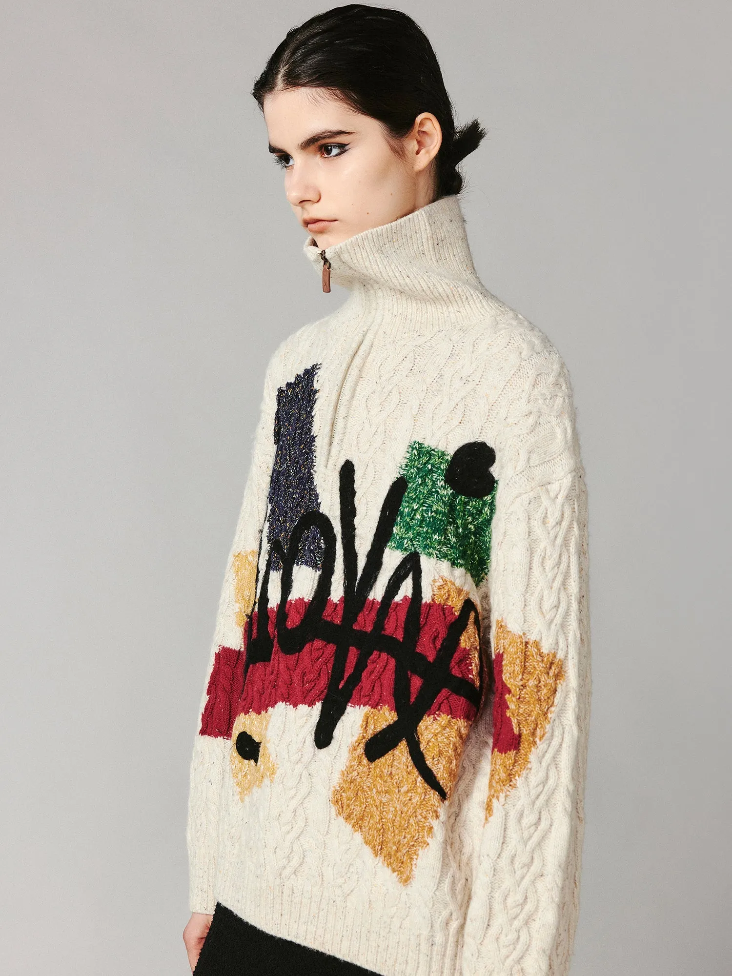 Graffiti cable-knit pullover