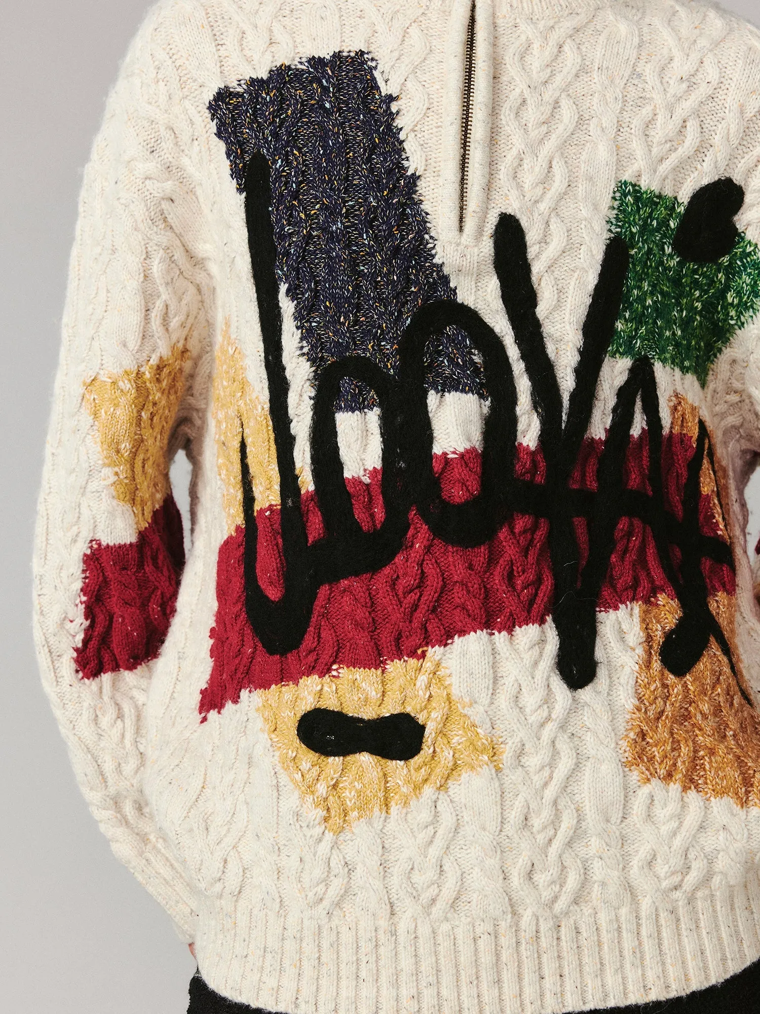 Graffiti cable-knit pullover